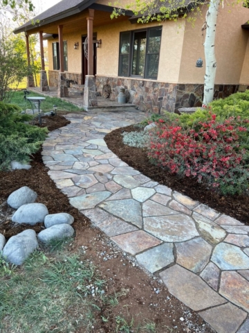 MO Grizzly Flagstone walkway with finished landscaping, stone veneer